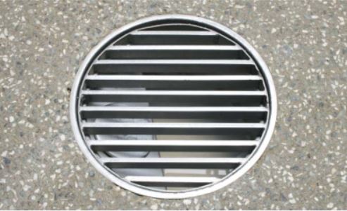 Round drain bar grate installed